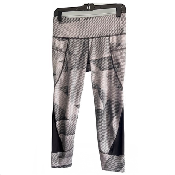 Athleta Pants - ATHLETA striped leggings. Gray and black size small. Pockets, hidden zipper